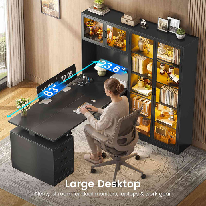SEDETA 63 Inch L Shaped Electric Standing Gaming Desk with Glass Display Cabinet LED Lights and Storage Drawers Height Adjustable Desk with Storage Shelves Power Outlet for Home Office