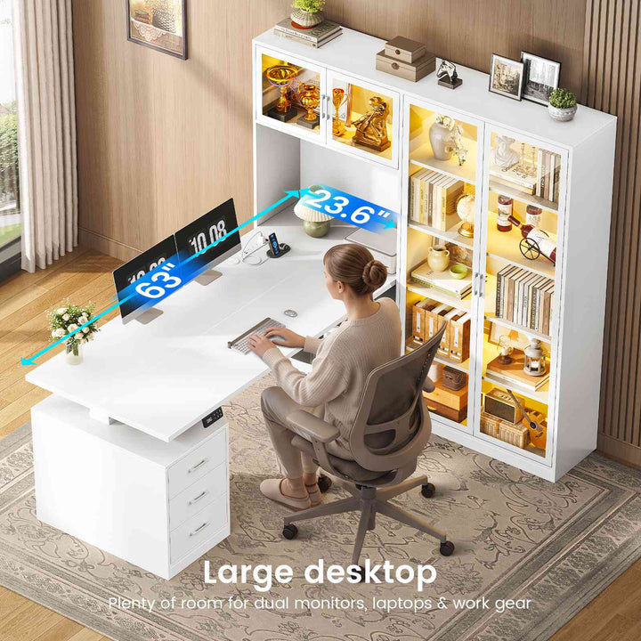 SEDETA 63 Inch L Shaped Electric Standing Gaming Desk with Glass Display Cabinet LED Lights and Storage Drawers Height Adjustable Desk with Storage Shelves Power Outlet for Home Office